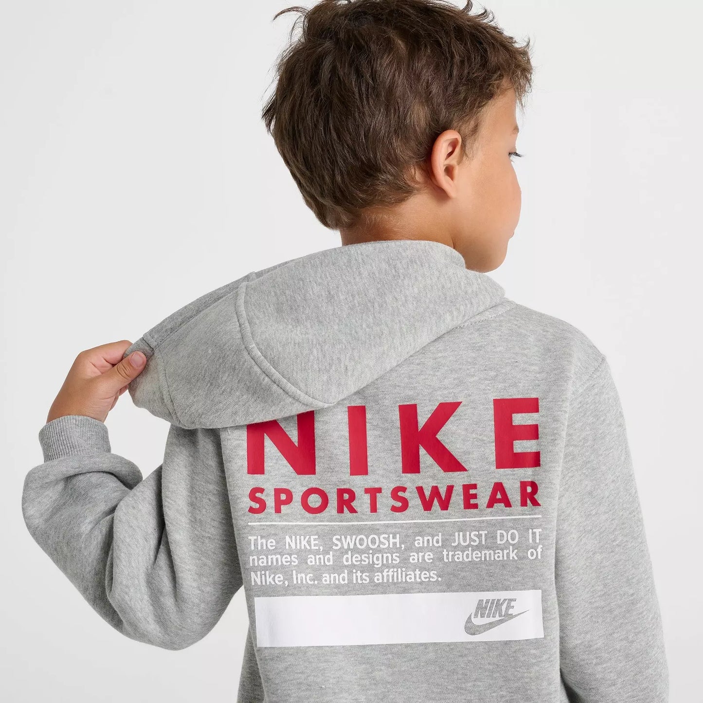 Conjunto de sudadera con capucha y pantalones deportivos Nike Sportswear Graphic para niños pequeños