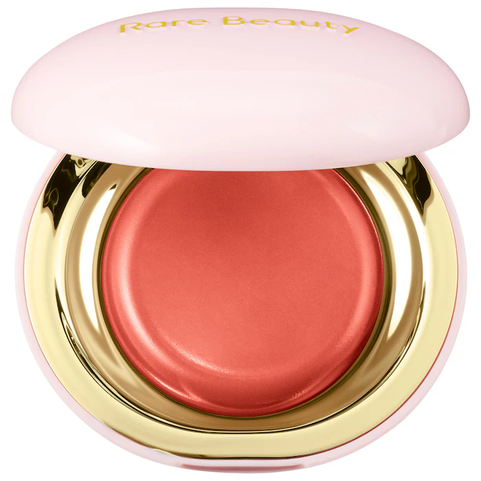 Rare Beauty by Selena Gomez - Stay Vulnerable Melting Cream Blush, rubor en crema innovador, de apariencia líquida, que se funde en una segunda piel para lograr el efecto de color más natural y suave